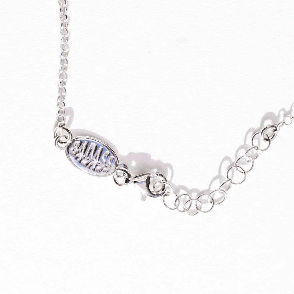 Closure of Clit Silver Necklace with  Badass logo. Rhodium Plated Made in Italy.